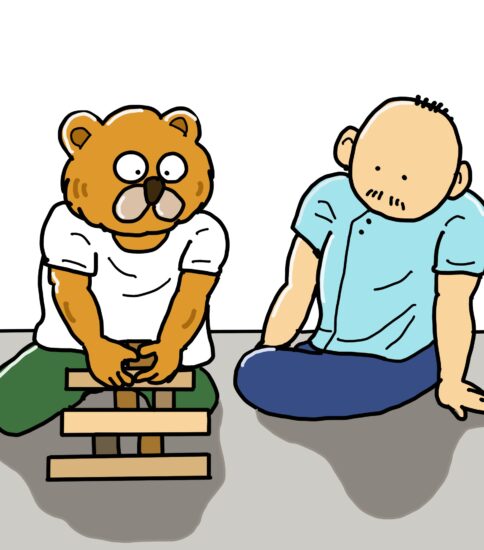 作業療法のイラスト（床上で積み木遊び）